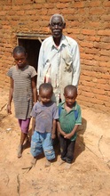 Bakari with his grandchildren