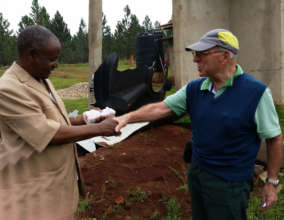 TDT project officer transfers donation to Kikukwe