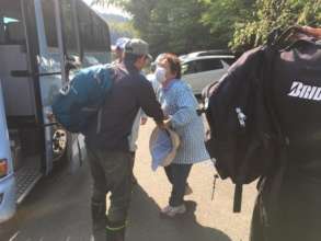 A local farmer welcoming the volunteers.