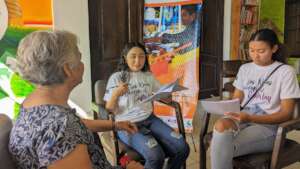 Young Women Conducting Interviews and Research