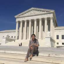 Law student Keyla in front of the US Supreme Court