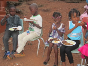 Dream Home children enjoying a meal