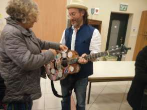 Sticking mandala on the guitar
