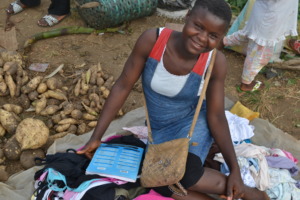 Remy, one of the girls supported, in the market