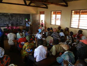 Festo speaks to a classroom full of parents