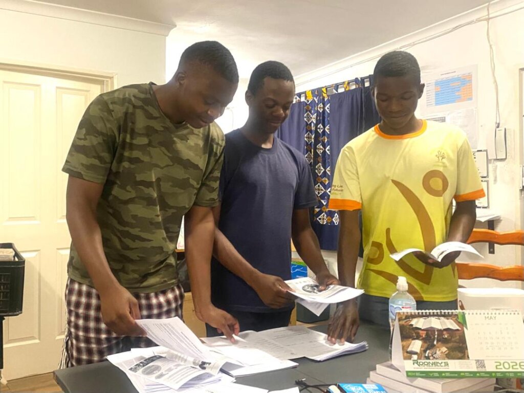 Students volunteering - sorting application forms