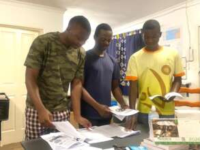 Students volunteering - sorting application forms
