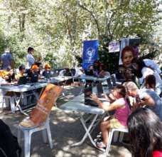 Children at the coding workshop in the park