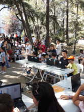 Children at the coding workshop in the park