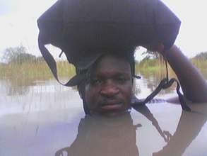 Hakeem, braving floods to make an insurance payout