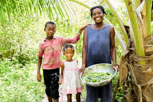 Wilda and her children in the garden