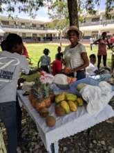 Madame Darlene preparing fresh fruit