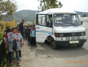 Their schoolbus: vintage minivan,4 trips each way