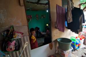 Peering out, while our nurse is in the home