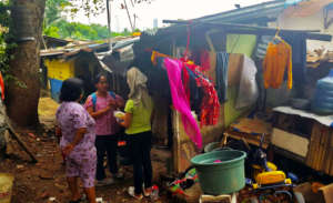 Nurse Neng enlists caring neighbours' support