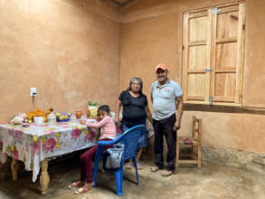 Women and children helping to build