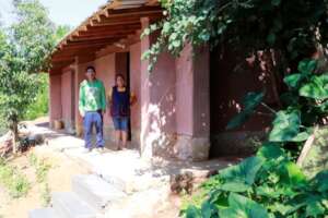 Family with its house