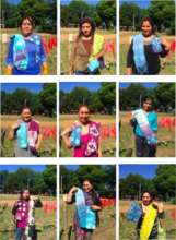 The women proudly show their new felt designs