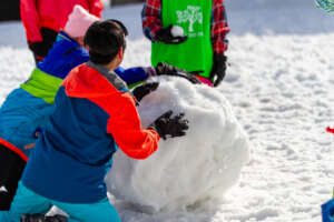 Campers making their first snow man