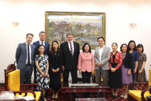 The team, and members of the Vietnamese Government