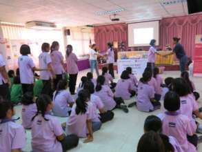 Girls learning basic self-defense