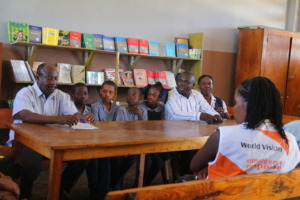 The committee has 4 students and 32 teachers