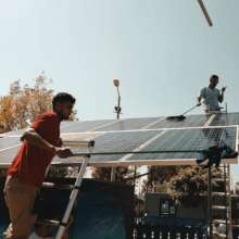 Our electricity team cleaning the solar panels!