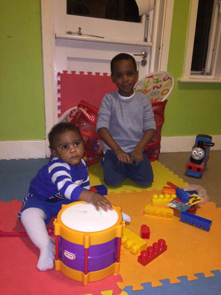 Kids playing in the shelter's kids room