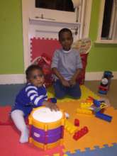 Kids playing in the shelter's kids room