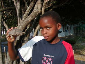 Thabang with a Leopard Tortoise
