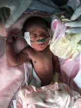 A child receiving oxygen