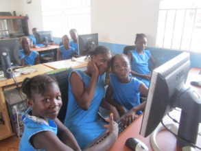Girls learning in computer lab