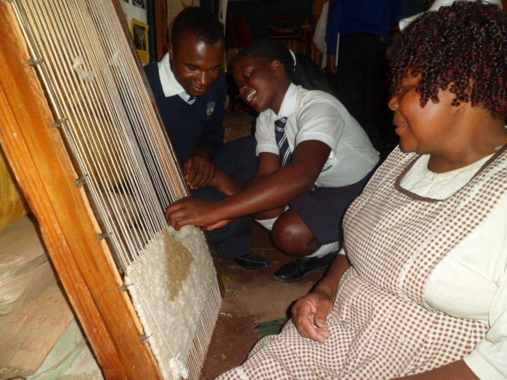 School children learning to weave, Zimbabwe
