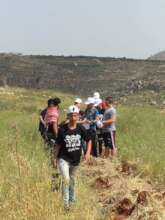 Children & youth help with the planting