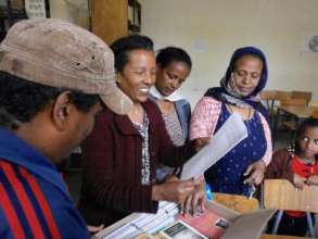 Lideta public librarians receive the books.