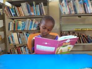 Junior reader - Dzitsoni Public Library, Kenya.