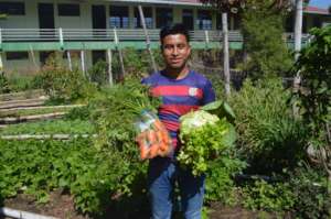 Organic vegetables will help feed this family of 7