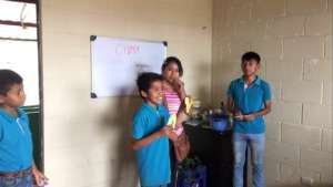Students teaching nutrition classes to moms