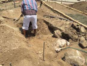 Digging down to make the garden beds