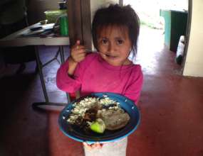 Enjoying eating Chaya for the first time