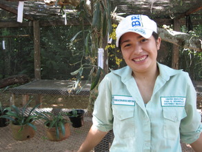 Silvani tends to the school's orchids