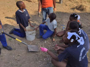 Students Learning to Garden