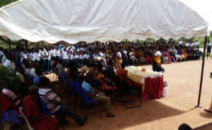 The community gathers.