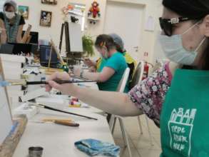 Patients of nursing home at a painting class