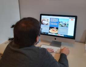 Vlad works on the presentation for Hilton