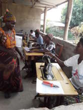 The mums working on sewing machines