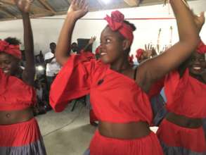 A local group performs a traditional Haitian dance