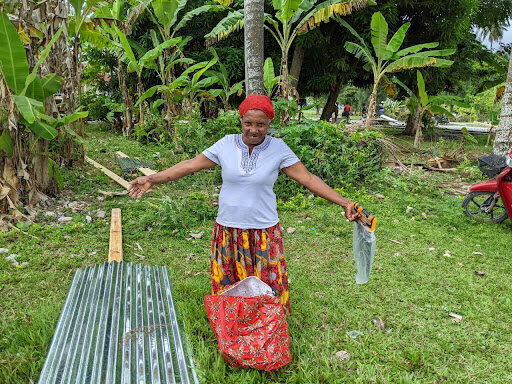 2021 earthquake survivor collects home repair kit