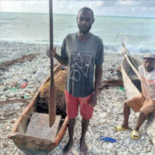 Typical Haitian fishing boat and oar