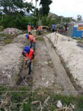 Trainees begin to break ground on one of the sites